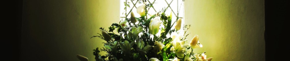 Flowers in church window cropped