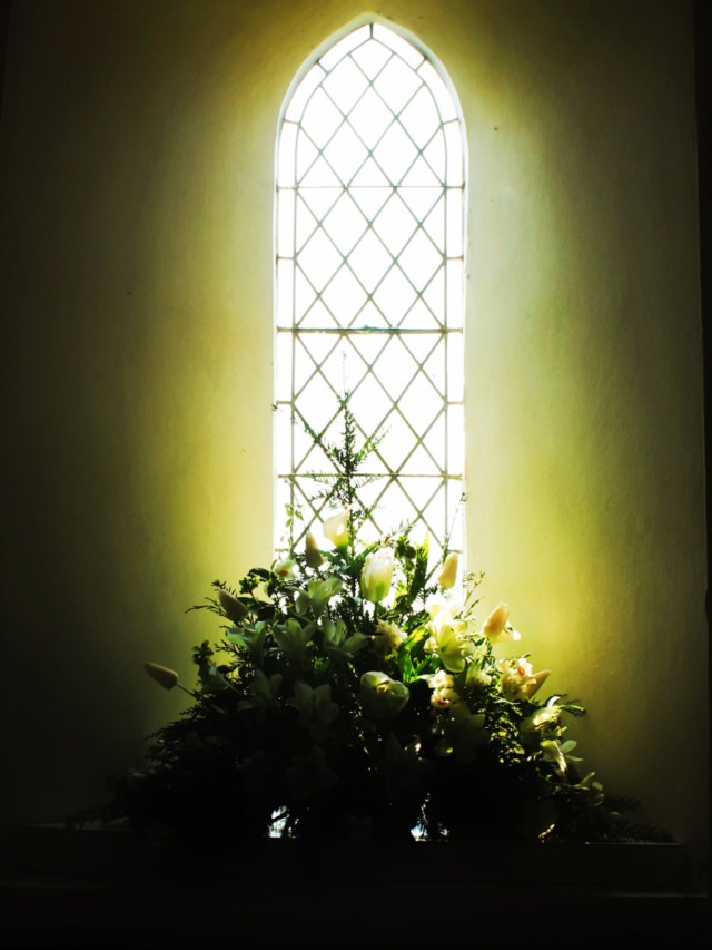 Flowers in church window